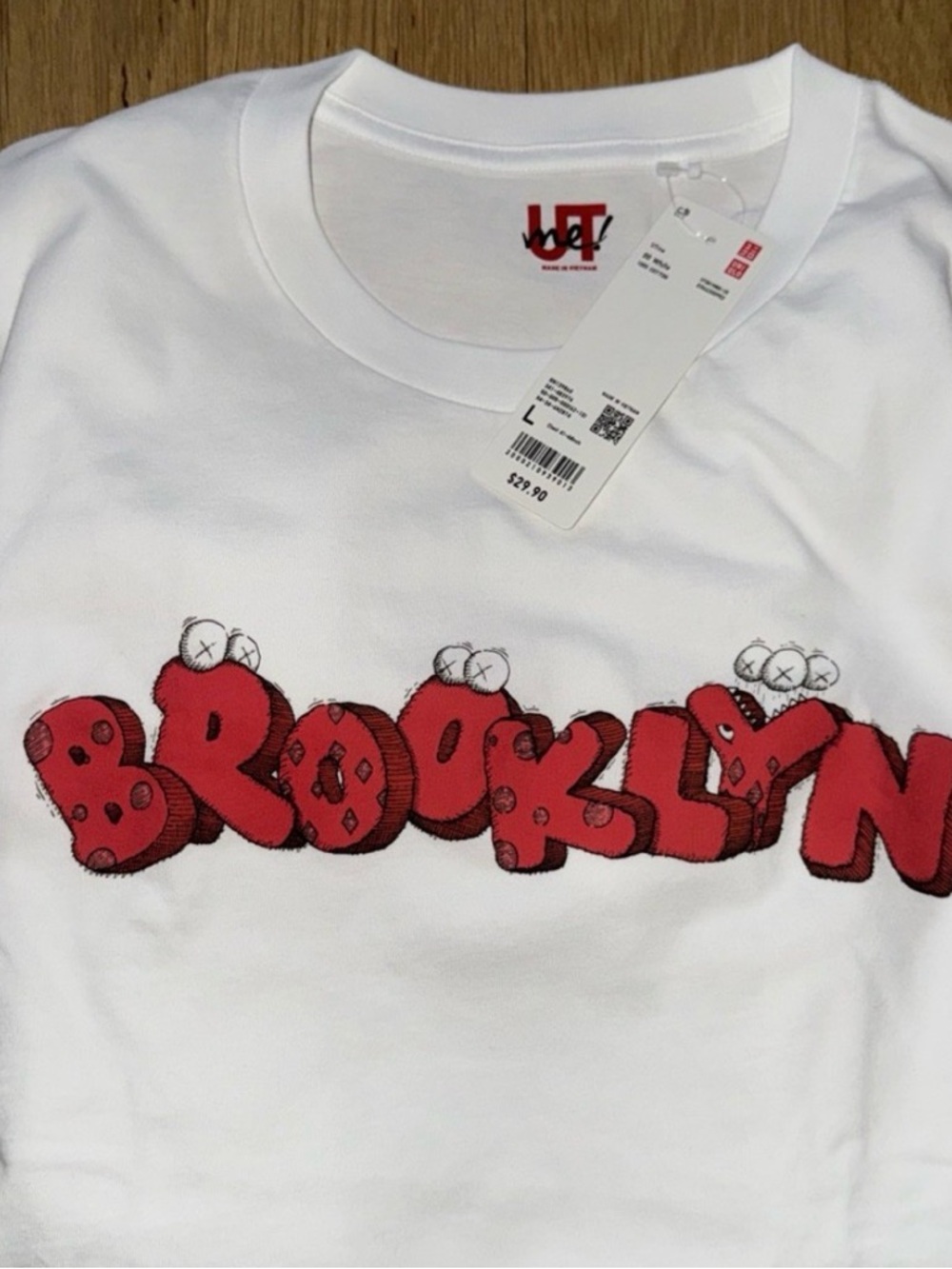 Uniqlo White Tee with Red 'Brooklyn' Graphic